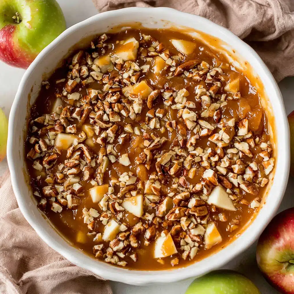 Caramel apple dip with cream cheese on wooden table
