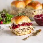 cranberry turkey sliders on wooden board