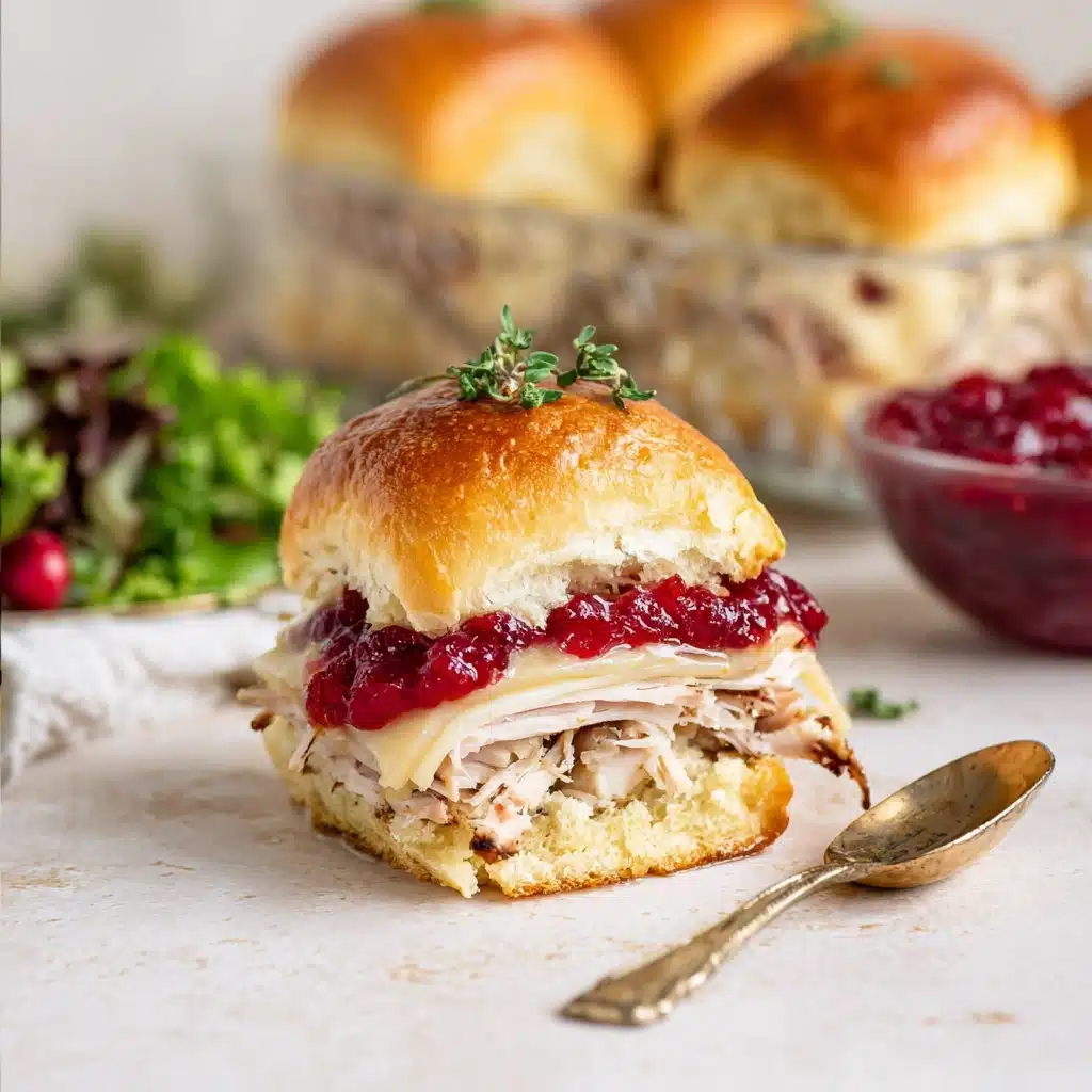 cranberry turkey sliders on wooden board