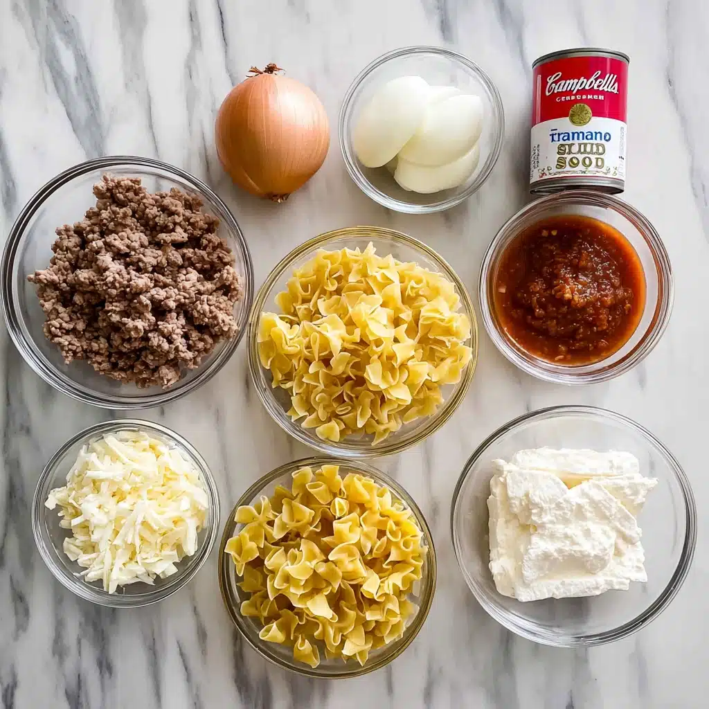 Ground Beef Stroganoff Recipe: The Ultimate Creamy Weeknight Comfort Meal 5 stroganoff ingredients flat lay