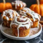 Pumpkin cinnamon roll muffins on tray